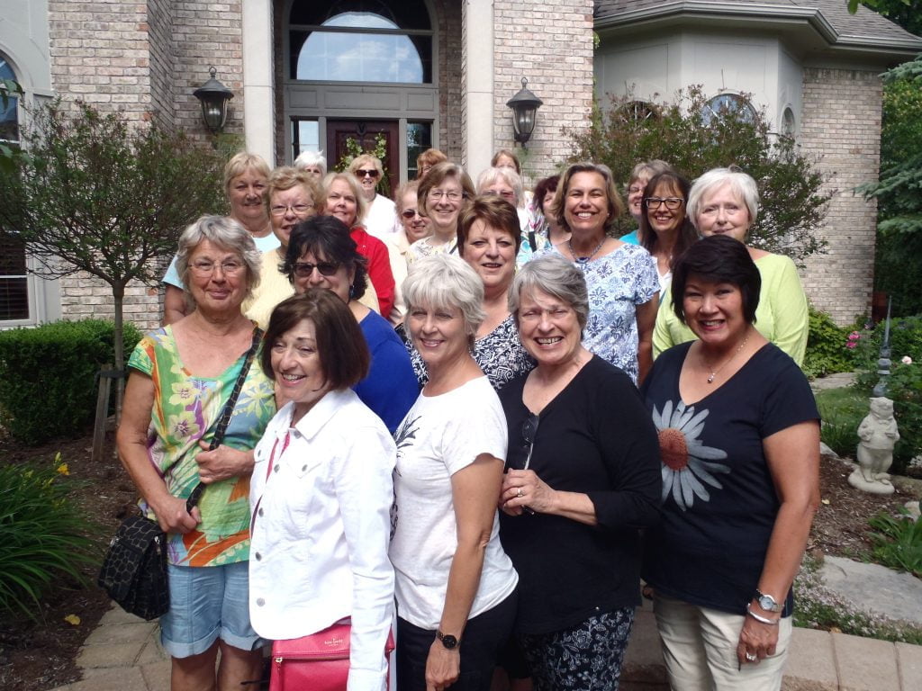 A large group went on the walk on a beautiful day.